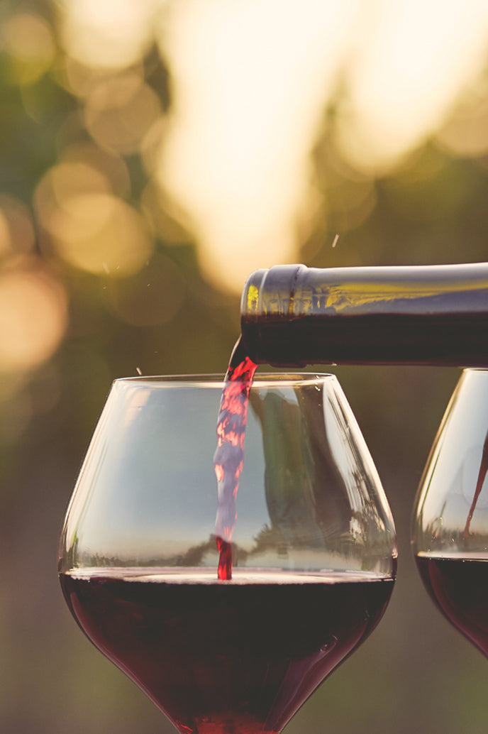 Syrah being poured on a glass