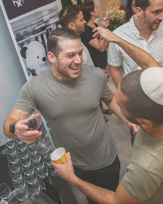 friends having fun at a wine tasting event