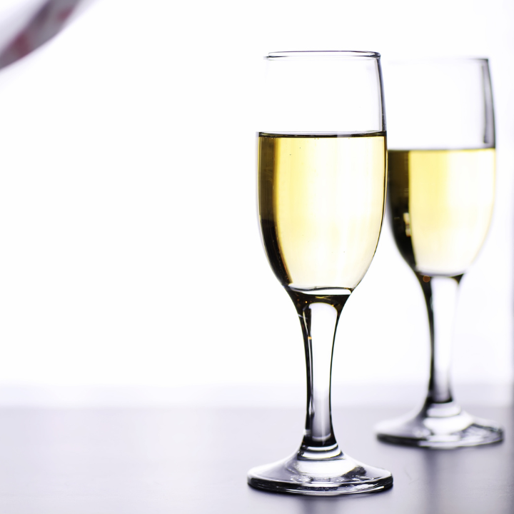 glass of pinot grigio on a table