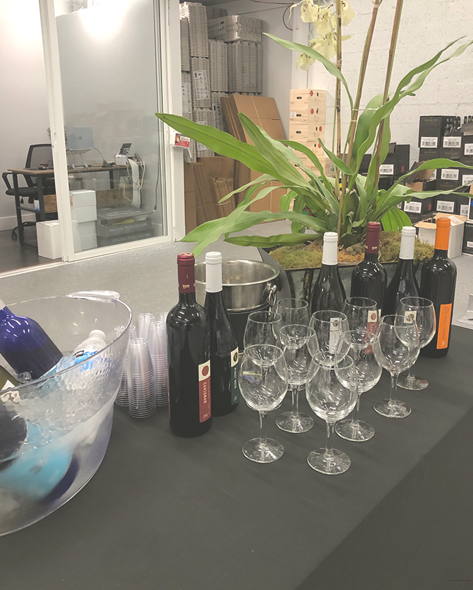 bottle of wines and wine glasses on a table
