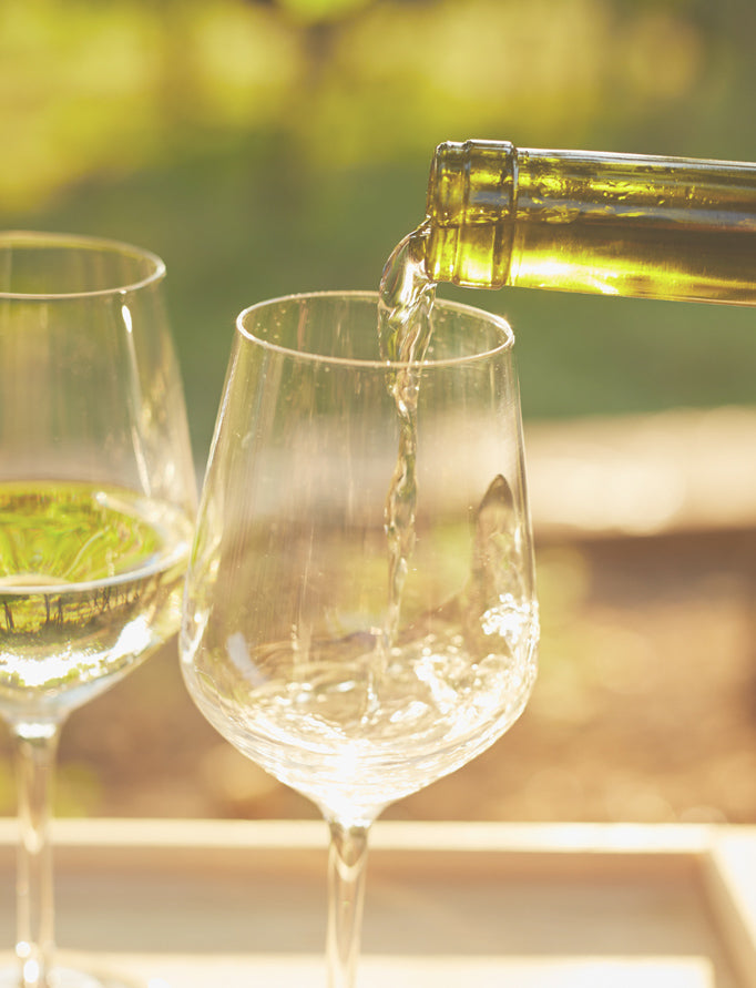 Glasses of white wine outdoors