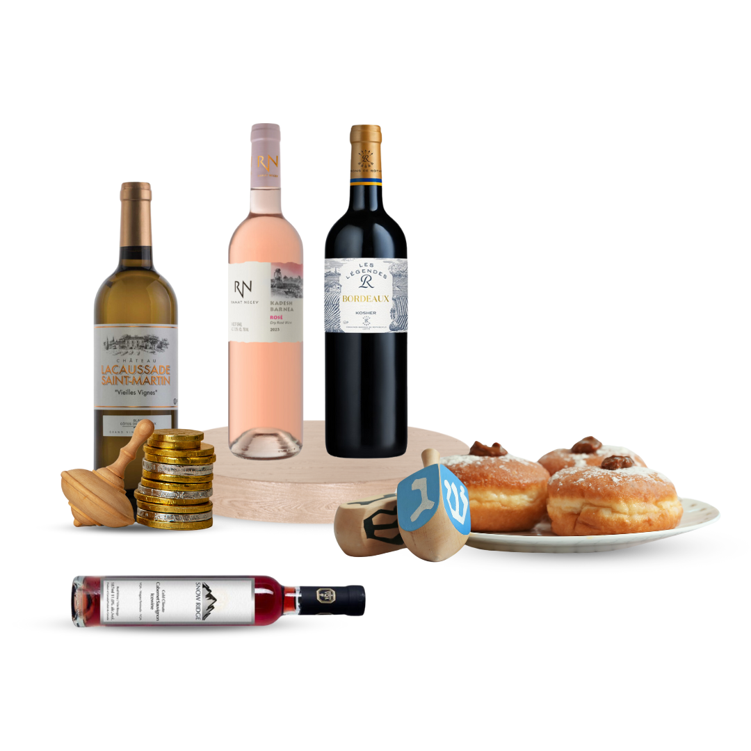 Kosher wine bottles with dreidels, gold coins, and sufganiyot on a festive Hanukkah display.