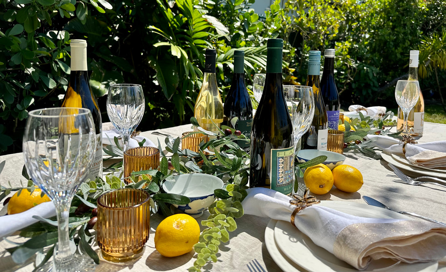 bottle of wines arranged in a feast table