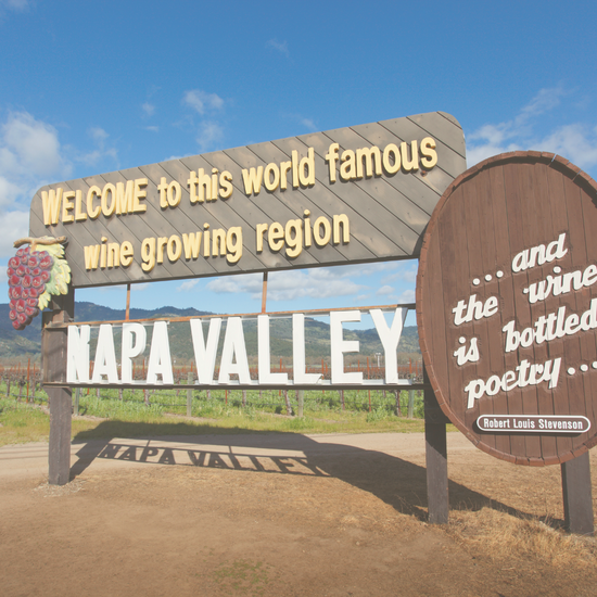 a sign welcoming visitors to the wine country of Napa Valley