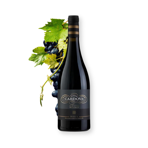 A bottle of Ramon Cardova Rioja Old Vines wine with a grapevine and black grapes in the background.