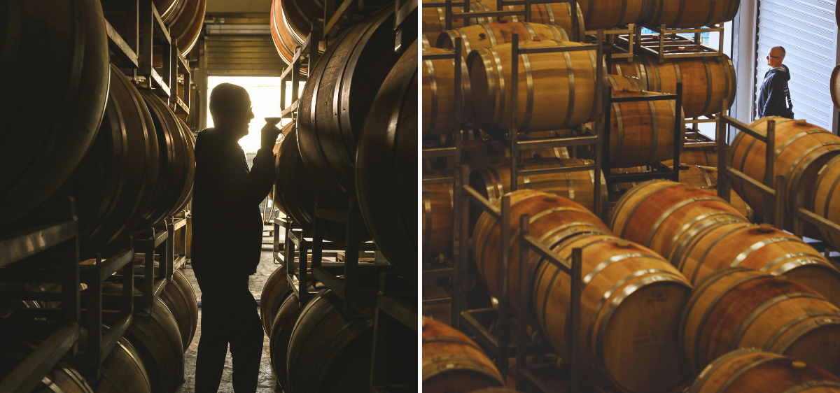 A composite image showing the silhouette of a person inspecting wine barrels in a dimly lit cellar and a distant view of the person standing near stacked wine barrels.