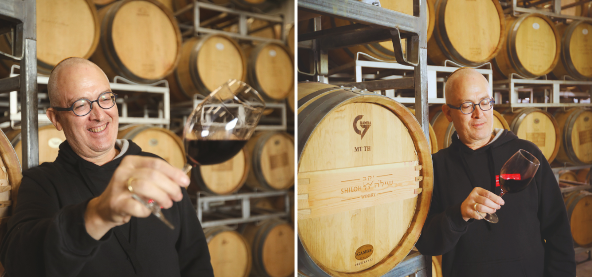 A composite image of Amichai Lourie inspecting red wine in a glass in a wine cellar. The background is filled with oak barrels.