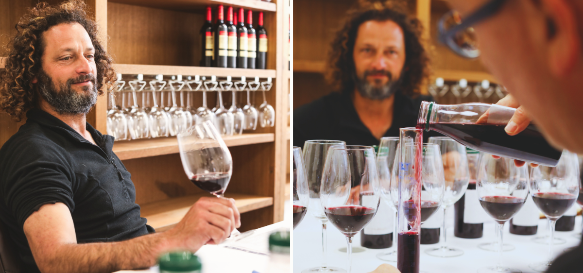 A composite image showing a man with curly hair tasting red wine in a wine tasting session. He is holding a wine glass, with shelves of wine bottles and glasses in the background.