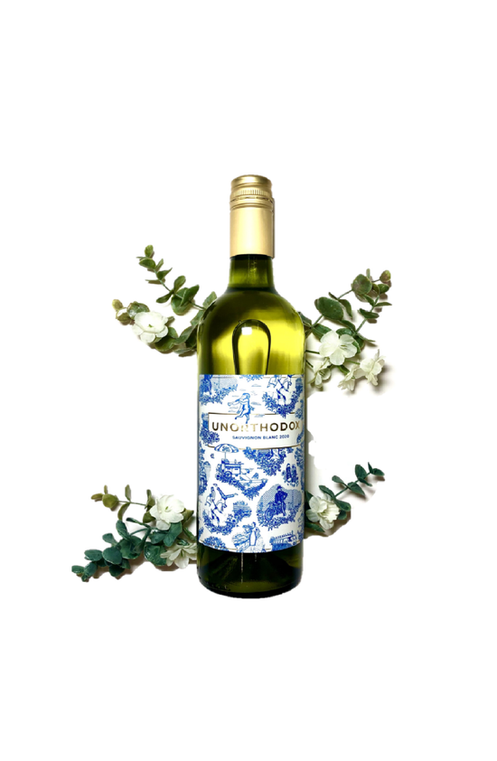 Bottle of Unorthodox Sauvignon Blanc with floral sprigs directly behind